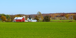 landscape view of red Midwestern farm and land
